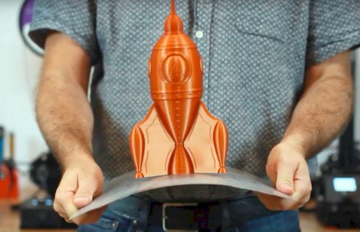 Removing a print by bending a flexible bed.
