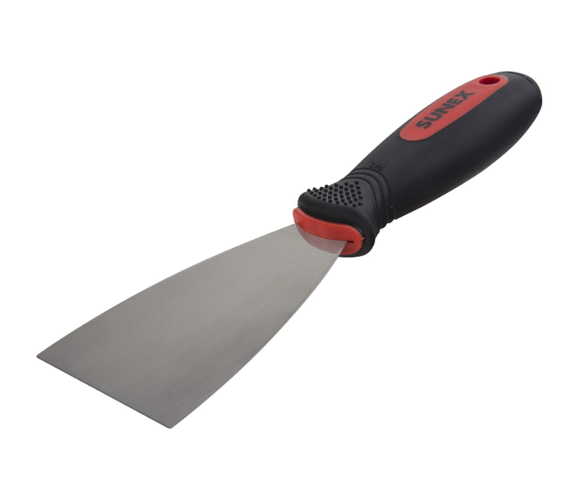 A standard putty knife for print removal.